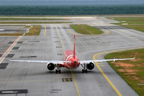 Air Asia (I5) aircraft on the apron.