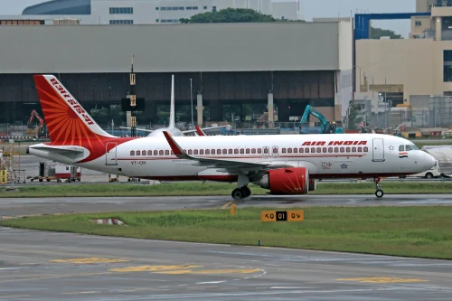 Air India (AI) aircraft on the apron.