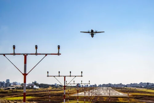 An Air Kenya Airbus A320 is taking off from the runway.