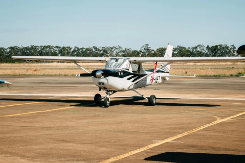 Air Namibia (8E) aircraft on the apron under clear skies.
