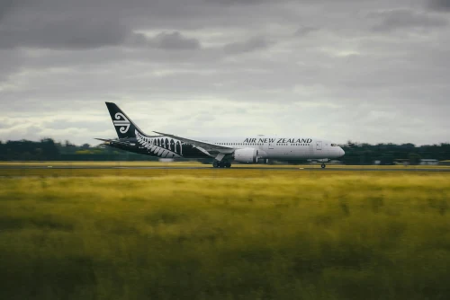 Air New Zealand (AK) aircraft on the apron.