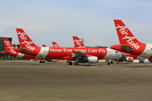 Airasia (QZ) aircraft on the apron.