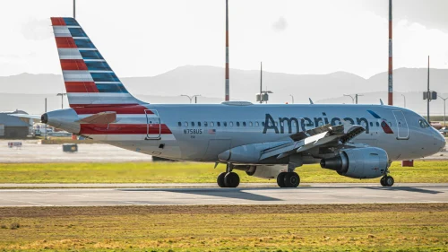 An American Airlines Airbus A319 taxiing on the apron.