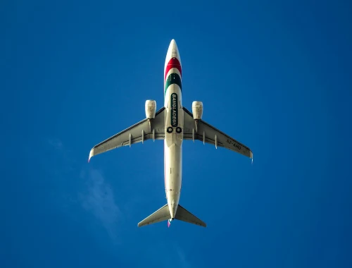 A Bangladesh Biman Boeing 737 flying overhead.