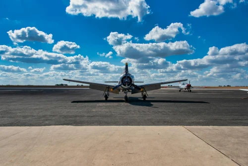 The Embraer EMB-110 Bandeirante is parked on the apron.