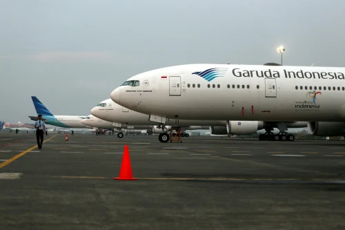 Garuda Indonesia (GA) aircraft on the apron.