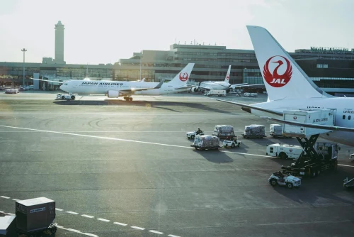 Japan Airlines (JL) aircraft on the apron.