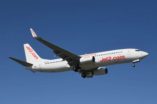 Jet2 (J2) aircraft on the apron under clear skies.