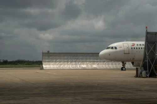 Mandalay Airlines (7Y) aircraft on the apron.