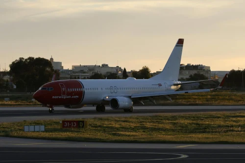 Norwegian Air Shuttle Boeing 737 (DY) on the airport apron.