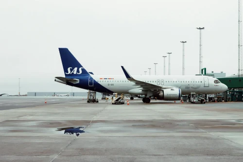 Sas (SK) aircraft on the apron.