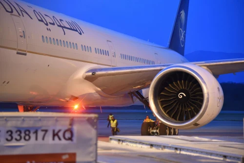 Saudi Arabian Airlines (SV) aircraft on the apron.