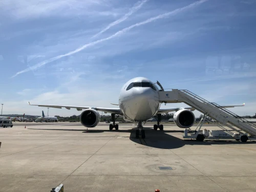 Tap Air Portugal (TP) aircraft on the apron under clear skies.
