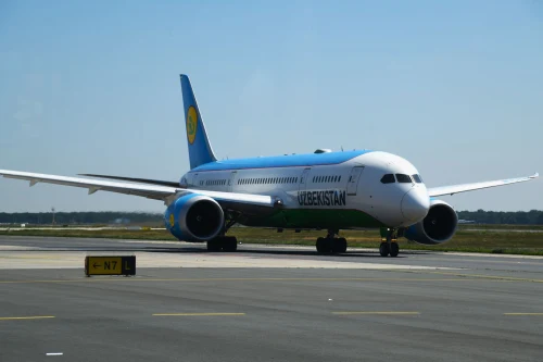Uzbekistan Airways Boeing 787-8 (HY) taxiing on the airport apron.