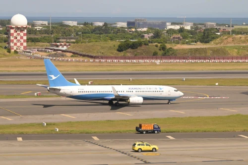 Xiamen Airlines Boeing 737 (MF) on the airport apron.