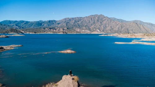 Scenic view of Potrerillos Lake with the Andes mountains in Mendoza, Argentina