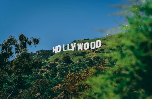 A scenic view of the famous Hollywood sign on a sunny day in Los Angeles