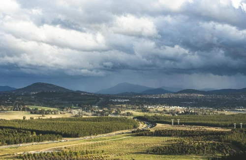 Stunning view of Canberra's countryside with dramatic clouds overhead