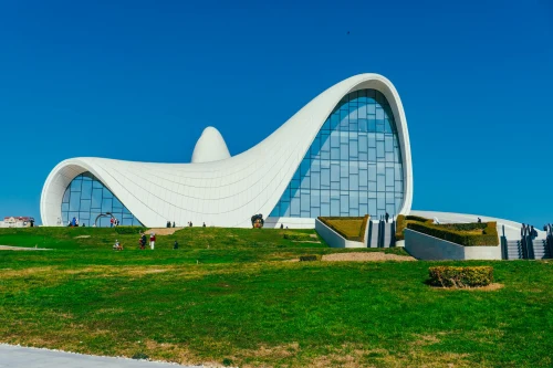 Stunning view of the iconic Heydar Aliyev Center in Baku, Azerbaijan on a sunny day