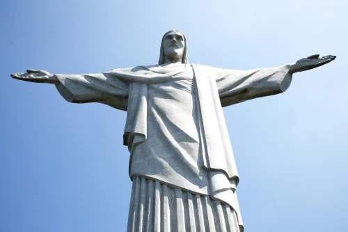 Iconic Christ the Redeemer statue under clear blue sky in Rio de Janeiro, Brazil