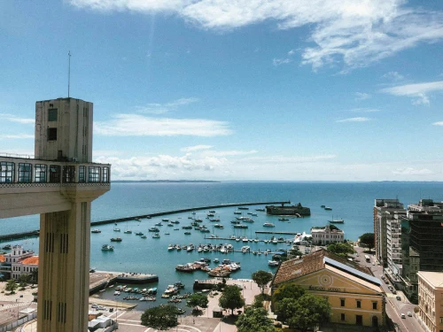 view of Salvador's vibrant harbor and the iconic Lacerda Elevator on a sunny day