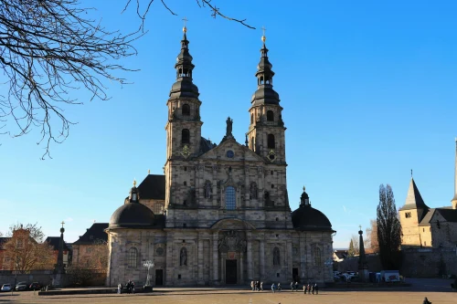 Stunning view of Fulda Cathedral, showcasing its Baroque architecture under a clear blue sky