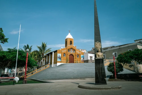 Scenic view of a historic church and monument in Pacasmayo, Peru on a sunny day