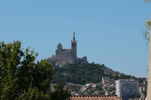 A clear view of Notre-Dame de la Garde basilica on a hill in Marseille, France