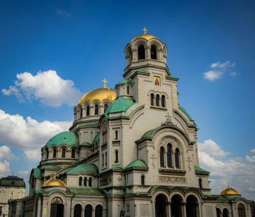 A stunning view of the Alexander Nevsky Cathedral in Sofia, showcasing its architectural grandeur under a clear blue sky