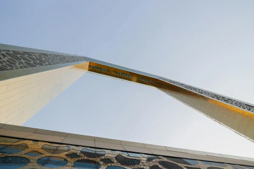 Unique low-angle view of the iconic Dubai Frame against a clear sky