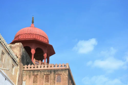 Stunning red dome on ancient palace in Bikaner, Rajasthan, India against a clear blue sky