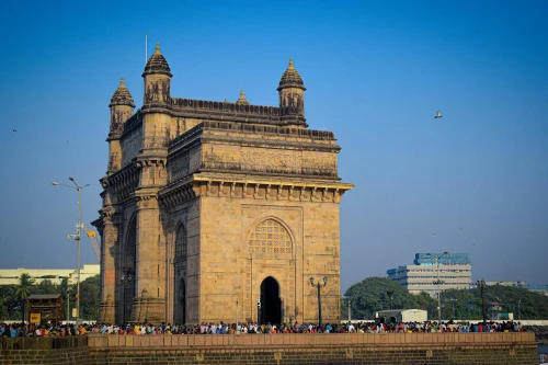 The iconic Gateway of India in Mumbai, a popular tourist attraction and historical landmark, on a sunny day