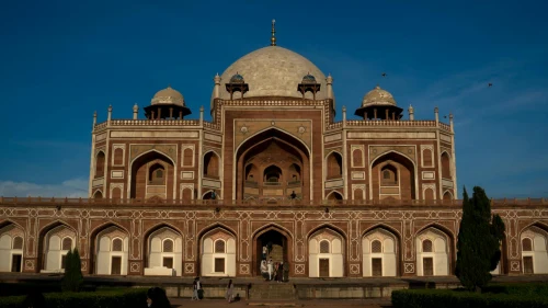 Capture of Humayun's Tomb in New Delhi with warm sunset glow highlighting Mughal architecture