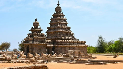 Ancient Shore Temple in Mahabalipuram, India, captured in daylight with clear blue sky