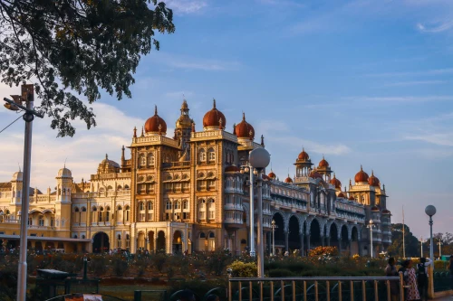view of Mysore Palace, an iconic landmark in India, captured with architectural grandeur against a clear blue sky