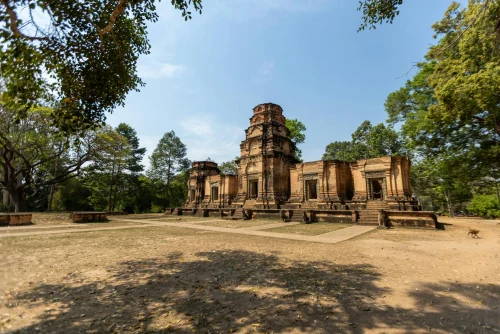 Explore the ancient ruins of a temple in Siem Reap, Cambodia under a clear blue sky