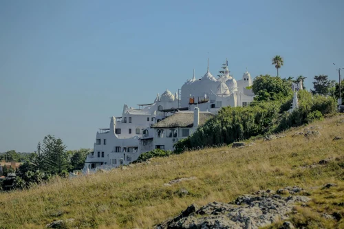 Sunny view of Casapueblo, a stunning architectural landmark in Punta Ballena, Uruguay