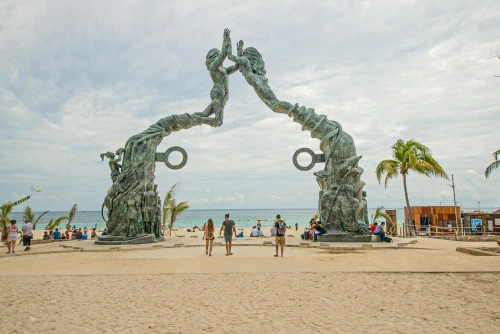 Stunning view of the Portal Maya sculpture on a sunny Playa del Carmen beach