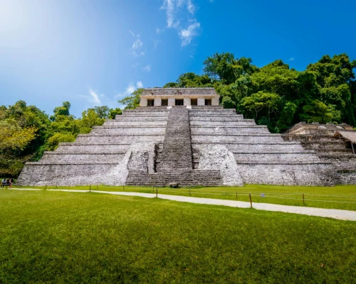 Capture of the iconic Pyramid of the Inscriptions in Palenque, Mexico under clear blue sky
