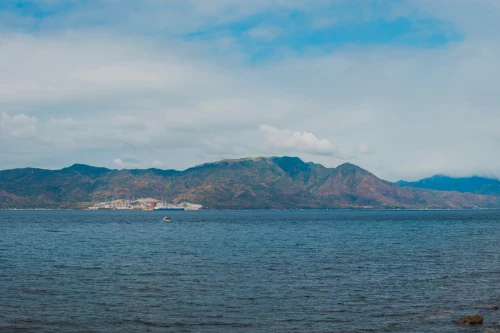 Captured panorama of Subic Bay with mountain backdrop under a blue sky