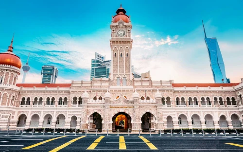 The iconic Sultan Abdul Samad Building against a clear sky in Kuala Lumpur, Malaysia