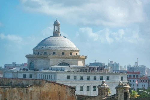 The iconic dome of the Capitol Building in San Juan, Puerto Rico under a clear sky