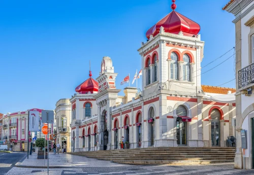 Stunning view of the iconic Loulé Market with distinct Moorish architecture under a bright blue sky