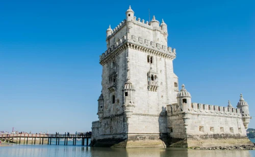Capture of the historic Belem Tower against a clear blue sky in Lisbon, Portugal