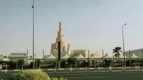 The iconic Fanar Mosque in Doha, Qatar, stands majestically under a clear blue sky
