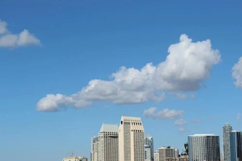 San Diego skyline with skyscrapers and clouds on a bright day
