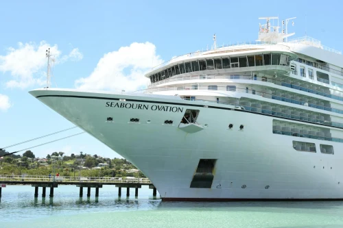 Seabourn Ovation cruise ship docked in Saint John, Antigua under a bright blue sky